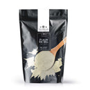 A black resealable bag labeled The Spice Lab Fleur de Sel Sea Salt, featuring a wooden spoon filled with coarse gourmet sea salt on the front. Brand: The Spice Lab. Net weight: 1 lb. This exquisite finishing salt is perfect for elevating any dish.
