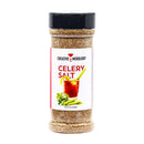 A clear plastic container of The Spice Lab Creative Mixology Celery Salt with a black lid, displaying an image of a Bloody Mary cocktail and celery stalks on the label—perfect as a cocktail rim seasoning.
