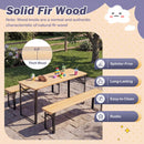 The 43.5 Inch Folding Kids Picnic Table & Bench Set No Assembly Wooden Toddler Table by DirectDeals sits on a stone patio with toys on top, and features splinter-free, durable fir wood that’s easy to clean. Tree and grass in background.