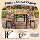 Two kids enjoy snacks outdoors on the 43.5 Inch Folding Kids Picnic Table & Bench Set No Assembly Wooden Toddler Table by DirectDeals, which features a sturdy triangular metal frame and solid fir wood tops for lasting durability.