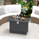 Create a cozy patio with a curved wicker sofa, cushions, rug, and potted flowers around the DirectDeals 44.5 Inch Propane Fire Pit Table Rattan Gas 2-in-1 with Stainless Steel Burner holding drinks and snacks.