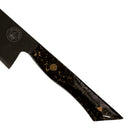 The Spaceman Knives Galaxy Series Chef Knife, crafted from 10CR18MOV steel with a dark, gold-flecked handle, sits against a swirling galaxy backdrop. Experience stellar precision cutting with Spaceman Knives.