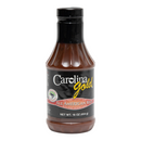 A bottle of Gourmet Carolina Gold All American Red Carolina Gold BBQ sauce, a tangy Southern tomato-based barbecue sauce.