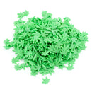 A colorful pile of The Spice Lab Hemp Leaf Sprinkles (CBD & THC Free) features small, green, leaf-shaped decorations resembling playful cannabis leaves, arranged on a white background—perfect edible party accents from The Spice Lab.