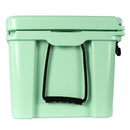 A light green Bob - The Cooler Co. 50 QT/47.3L Hard Cooler - El Amigo, designed with extra thick insulated walls, a black rope handle with textured grip, and a removable dry basket, is displayed against a white background.