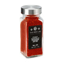 A clear glass jar with a silver lid holds vivid red The Spice Lab Guajillo Chile Powder. Its black label displays “The Spice Lab, Guajillo Chile Powder 2K-5K, No. 69, Net Wt. 1oz.” Ideal for authentic Mexican recipes and seasoning blends, this vibrant spice adds traditional flavor to your favorite dishes.
