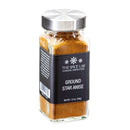 A clear glass jar with a silver lid, labeled The Spice Lab Ground Star Anise from The Spice Lab, contains finely ground star anise—a spice that adds a sweet, licorice-like flavor to recipes. Net weight: 1.6 oz (45g).