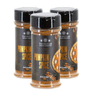 Three bottles of The Spice Lab Pumpkin Pie Spice from The Spice Lab are displayed together, each with a black lid and a label showcasing pumpkin pie and spices—a must-have Pumpkin Pie Spice Blend ideal for all your autumn baking needs.