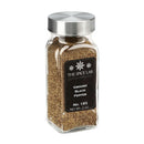 A square glass jar with a silver lid, filled with ground black pepper—an everyday essential from The Spice Lab. The black label features the brand name, The Spice Lab Ground Black Pepper, No. 185, Net Wt. 2 oz.
