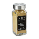 A glass jar with a silver lid contains The Spice Lab Ground Oregano, a classic Mediterranean herb perfect for everyday seasoning. Its black label displays The Spice Lab brand and highlights Ground Oregano, No. 187, Net Wt. 1.65oz., making it an aromatic addition to your kitchen.