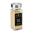 A clear glass jar with a metal lid holds ground white pepper—the perfect seasoning for both chefs and home cooks. Its black label features The Spice Lab brand and the product name, “Ground White Pepper,” with a net weight of 2.2 oz., making it a premium choice for any bulk foodservice spice collection.