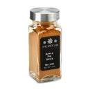 A clear glass jar with a silver lid holds The Spice Lab Apple Pie Spice Blend, a favorite baking spice. The black label displays “The Spice Lab Apple Pie Spice Blend, No. 240, Net Wt. 2oz.” This seasonal spice jar is photographed against a white background.