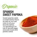 A wooden bowl filled with vibrant red The Spice Lab Organic Spanish Sweet Paprika powder, accompanied by text highlighting its sweet, smoky flavor and recommended uses such as deviled eggs, avocado toast, and potato salad. Ideal for enriching BBQ rubs or adding an authentic finishing touch of The Spice Lab’s Organic Spanish Sweet Paprika to your favorite dishes.