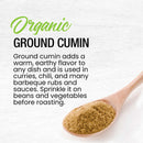 A wooden spoon filled with The Spice Lab Organic Ground Cumin rests on a white surface, accompanied by text highlighting this premium spice’s rich flavor and versatility in dishes, BBQ rubs, curries, beans, and vegetables.