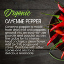 A bowl of fresh red chili peppers rests on a wooden surface beside text highlighting The Spice Lab Organic Cayenne Pepper by The Spice Lab, detailing its uses in Mexican cuisine and its bold, vibrant flavor profile.