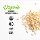 A pile of The Spice Lab Organic Hulled Sesame Seeds, ideal for baking and stir-fries, is displayed next to text and symbols indicating USDA Organic, Kosher, All Natural, and Packed in USA certifications on a white background.