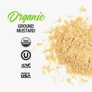 The Spice Lab Organic Ground Mustard powder is scattered on a white background with text reading The Spice Lab Organic Ground Mustard and certification icons for USDA Organic, Kosher, All Natural, and Packed in USA. Perfect for enhancing cheese dishes or crafting flavorful spice blends, this organic ground mustard from The Spice Lab delivers pure taste to your kitchen.