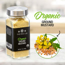 A jar labeled The Spice Lab Organic Ground Mustard sits next to mustard seeds and yellow mustard flowers, with The Spice Lab Organic Ground Mustard written in green and black. Perfect for enhancing cheese dishes or adding depth to your favorite spice blends, this organic ground mustard from The Spice Lab brings vibrant flavor and a touch of natural beauty to any kitchen.