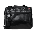 Black cooler bag by Bison Coolers with bottle opener attached and USA flag label visible.