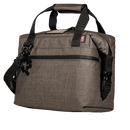 Shale soft-sided cooler by Bison Coolers with black straps, handle, zipper, and an American flag patch.