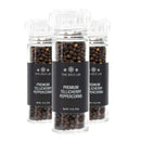 A set of three upright clear plastic grinders filled with whole black peppercorns, each labeled The Spice Lab Premium Tellicherry Peppercorns with Grinder 3-Pack, is displayed against a white background—ideal for adding bold, freshly ground black pepper to your meals at home.