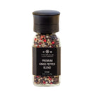 A clear grinder from The Spice Lab, filled with a vibrant mixed peppercorn blend, features a black label reading “The Spice Lab Premium Kings Peppercorn Grinder” and a matching black cap—perfect for adding the bold flavor of freshly ground pepper to any dish.