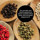 Four wooden spoons hold black, white, pink, and green peppercorns. Overlaid text describes The Spice Lab’s aromatic and colorful Premium Kings Pepper blend—featuring all four gourmet peppercorn varieties—as the perfect addition to The Spice Lab Himalayan Pink Salt & Premium Kings Pepper Grinder Set. Pair this blend with Himalayan Pink Salt for the ultimate seasoning experience and discover vibrant flavors in every grind from The Spice Lab.