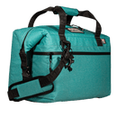 Seafoam soft-sided cooler by Bison Coolers with black straps and zipper.