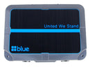 Blue Coolers Premium Marine Grade 30 Quart Cooler Topper: a rectangular gray marine grade cooler lid featuring a black top insert with a blue horizontal line, the text United We Stand, and a blue logo.