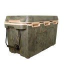 The Taiga Coolers 55 Quart Woodland Camo Cooler by Taiga Coolers features rope handles, tan latches, a fish logo, and superior insulation—ideal as a hunting cooler. Shown on a plain white background.
