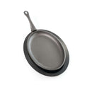 Napoleon cast iron skillet for fajitas with wooden serving tray, perfect for high-heat searing and tabletop presentation