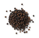A pile of whole black peppercorns is scattered on a white background, ready to be used in The Spice Lab Premium Black Pepper Grinder by The Spice Lab for freshly ground pepper.