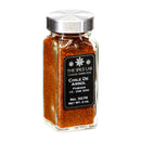 A glass jar with a metal lid holds The Spice Lab Chile de Arbol Powder, a hot chile powder made from Chile de Arbol peppers. The black label displays: The Spice Lab, Chile de Arbol Powder, 15-35K SHU, No. 5076, Net Wt. 2 oz. Ideal for bulk foodservice or home kitchens looking to add bold flavor.