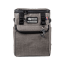 Gray soft-sided cooler by Bison Coolers with a top zipper, front pocket, and bottle opener.