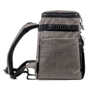 Gray soft-sided cooler by Switchback with black carrying handle and padded shoulder straps.