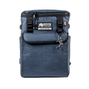 Navy soft-sided cooler by Bison Coolers with a bison shaped bottle opener hanging from it.