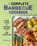The cover of "The Complete Barbecue Cookbook: Expert Advice and Foolproof Recipes for BBQ Perfection – Hardcover" by Books from splitShops showcases an appetizing assortment of grilled meat, chicken, corn, and asparagus artfully arranged on a tray. The bold title text pops against a green background, making this cookbook an inviting resource for anyone eager to master essential BBQ techniques.