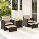 The 5 Pieces Patio Rattan Furniture with 2 Ottomans and Tempered Glass Coffee Table-Red by DirectDeals creates a cozy outdoor conversation area on a porch, enhanced by greenery and a large rug.