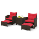 Two wicker armchairs with red cushions, 2 ottomans, and a tempered glass coffee table from the DirectDeals 5 Pieces Patio Rattan Furniture with 2 Ottomans and Tempered Glass Coffee Table-Red set.