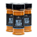 Three bottles of The Spice Lab Best of the Bay Seasoning, a reduced salt blend from The Spice Lab that’s specially crafted for seafood and shellfish, are placed side by side on a white background to showcase authentic coastal flavor.