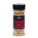 A clear plastic spice jar labeled The Spice Lab Everything and More Seasoning, filled with an all-purpose savory blend of garlic, onion, and other seasonings from The Spice Lab, displayed on a white background.