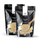 Two black resealable bags of The Spice Lab Chicago Chop Seasoning, each featuring a wooden spoon filled with the blend and a white maple leaf design in the background. Infused with savory hickory smoke for an authentic smoky steakhouse flavor, these 2 lb bags from The Spice Lab are perfect for adding bold Chicago Chop Seasoning to your favorite dishes.