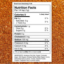 The Spice Lab Mexican Street Corn Seasoning nutrition label appears over a background of the savory blend. The label shows 0 calories, 1g carbs, and 105mg sodium per 1/4 tsp serving, highlighting flavorful ingredients such as Himalayan salt, chili peppers, and oregano—an ideal way to add authentic Elote seasoning flair to your favorite dishes from The Spice Lab.