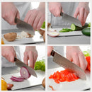 Four images display hands using the SpitJack 6.5″ Santoku Chef’s Knife to slice mushrooms, cucumbers, red onions, and red bell peppers on white cutting boards. This versatile SpitJack kitchen knife ensures effortless and precise cutting across a variety of ingredients.