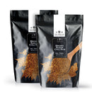 Here’s a revised version using your provided product data: Two black resealable bags of The Spice Lab Brown Sugar Chili Rub, each featuring The Spice Lab logo and product information in white text, are shown with a wooden spoon and chili rub spice displayed on the front. This flavorful BBQ seasoning blend is ideal for adding smoky, sweet heat to your favorite dishes—making it a perfect choice for any kitchen.