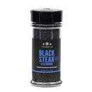 A 5.9 oz (167g) plastic jar of The Spice Lab Black Steak Seasoning by The Spice Lab, featuring black granules with activated charcoal. The label highlights this seasoning as ideal for beef and steak, providing a savory steakhouse flavor.