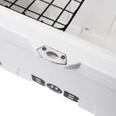 Close-up of the Bob The Cooler Co. 75QT "BFF" Hard Cooler in white, featuring extra thick insulated walls and a built-in metal bottle opener. A portion of the included black wire basket and the brand name "Bob" can be seen on the cooler.