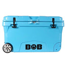 Introducing the Bob The Cooler Co. 75QT / 70.97L "BFF" Hard Cooler: a blue cooler equipped with heavy-duty wheels, sturdy black latches, a convenient handle, and the signature Bob - The Cooler Co. lightning bolt logo on the front. With extra thick insulated walls, it keeps your items cold for longer—perfect for any adventure.
