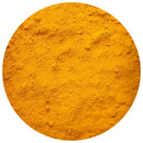 A circular frame showcases The Spice Lab Organic Ground Turmeric by The Spice Lab, featuring a vibrant yellow-orange hue and a fine, slightly clumpy texture—an essential ingredient often used in Indian cooking.