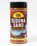 Experience the bold flavors of the Southwest with Chiles & Smoke Sedona Sand Fiesta Seasoning by Chiles and Smoke. This all-purpose BBQ rub comes in a bottle featuring Southwestern-themed label graphics and a sleek black cap. Blended with chiles, herbs, and garlic, it’s perfect for adding a vibrant Southwest flair to your next barbecue.